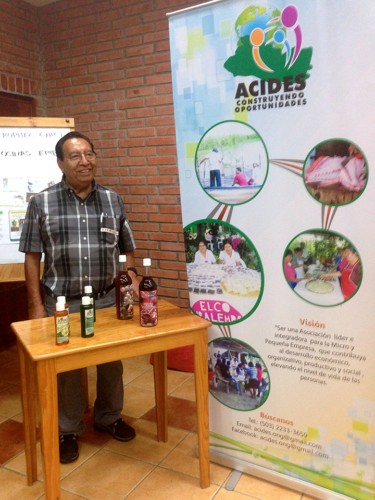 Filadelfo of ACIDES displays some of products made by the women